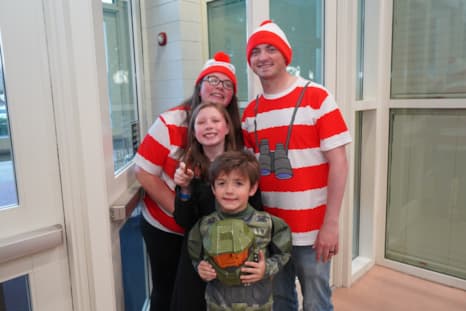 Family dressed up in costumes